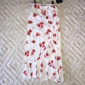 Wrap maxi skirt with ruffles.